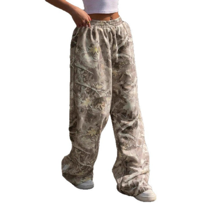 Versatile women's wide leg printed pants with elastic waist, great for beachwear or everyday casual outfits.