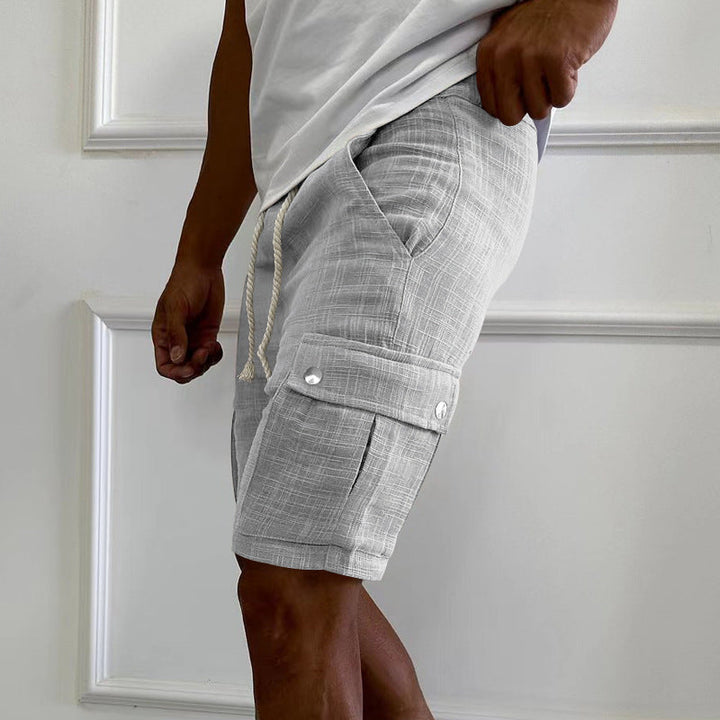 Stylish men's casual cargo shorts, perfect for summer comfort. Features breathable fabric and a relaxed fit.