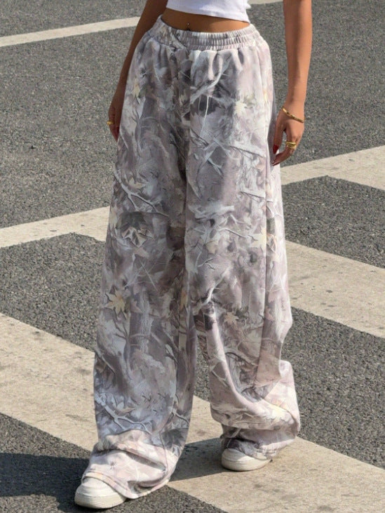 Close-up of the vibrant print on women's wide leg pants, showcasing the comfortable elastic waist.