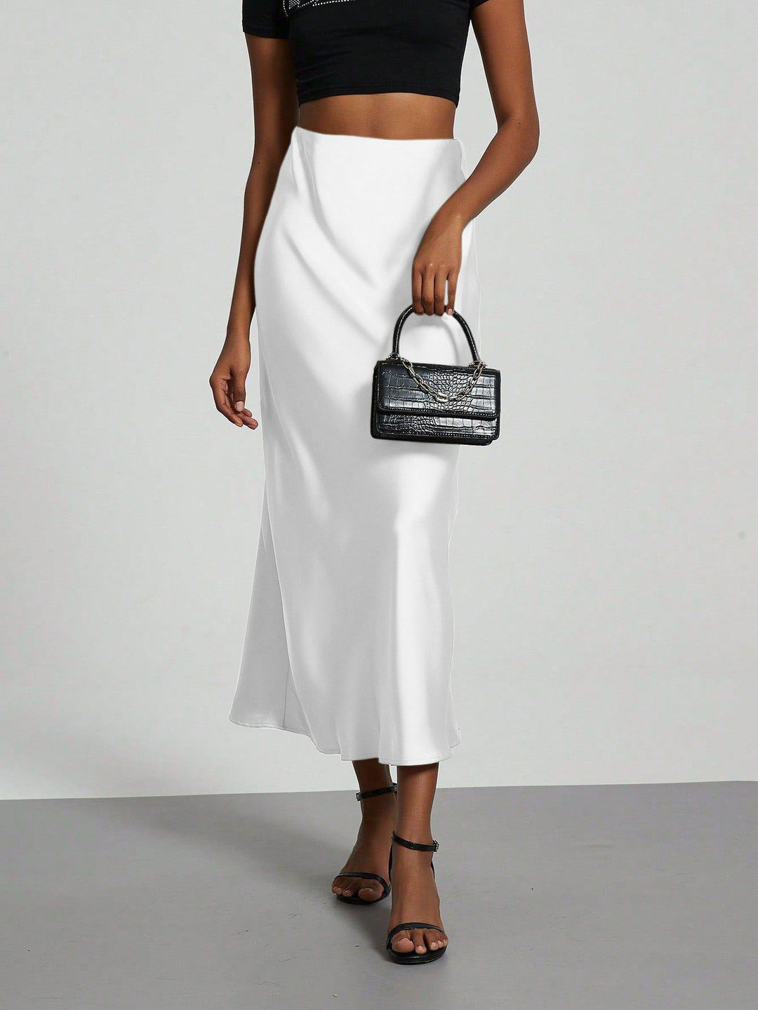 Chic women's flowing maxi skirt, perfect for casual elegance or formal evening wear.