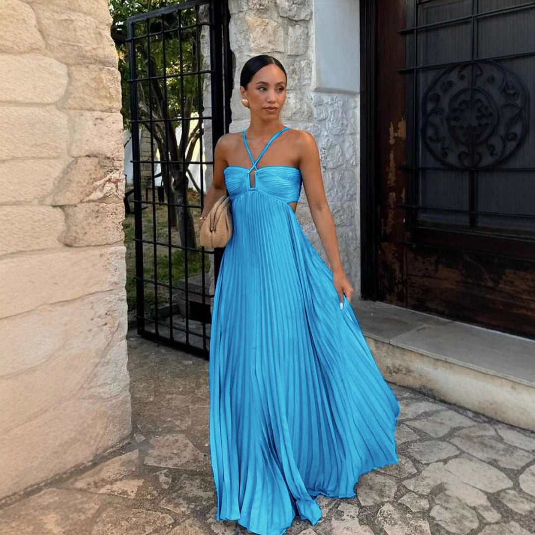 Stylish women's off-shoulder pleated cocktail dress. Features elegant spaghetti straps for a chic look.