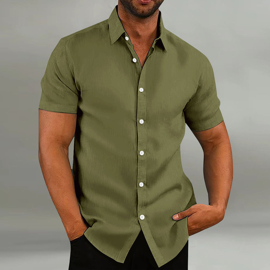 Lightweight men's summer leisure shirt, short sleeve and button placket for a cool, casual look.