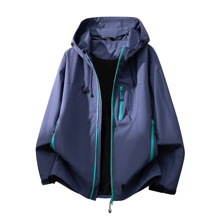 Close-up of waterproof fabric on a women's technical outdoor jacket, ultimate all-weather protection.
