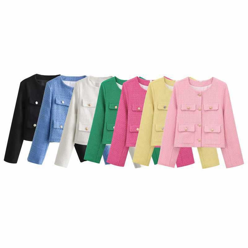 Stylish ladies jacket with prominent gold buttons, adding a touch of elegance to any attire.