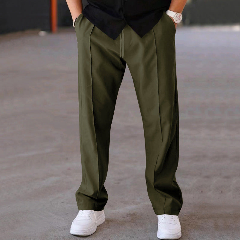 Men's grey sweatpants with practical side pockets, perfect for casual & athletic wear.
