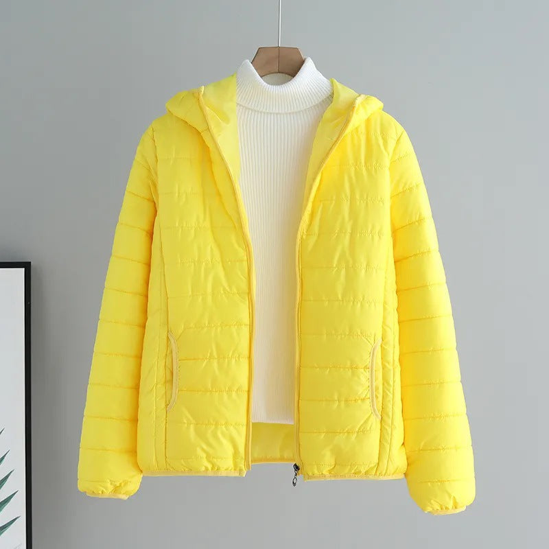 Khaki women's quilted transitional jacket with hood & pockets, great for everyday casual wear.