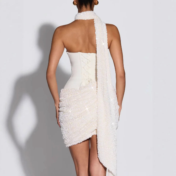 Shimmering sequin bustier mini dress for women, a short and sparkly cocktail or party dress for special occasions.