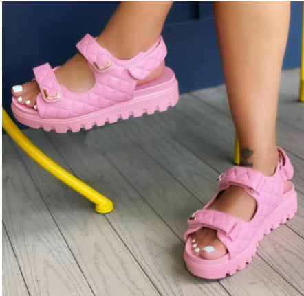 Modern women's platform sandals with non-slip sole, ergonomic straps, and open-toe design for ultimate summer comfort.