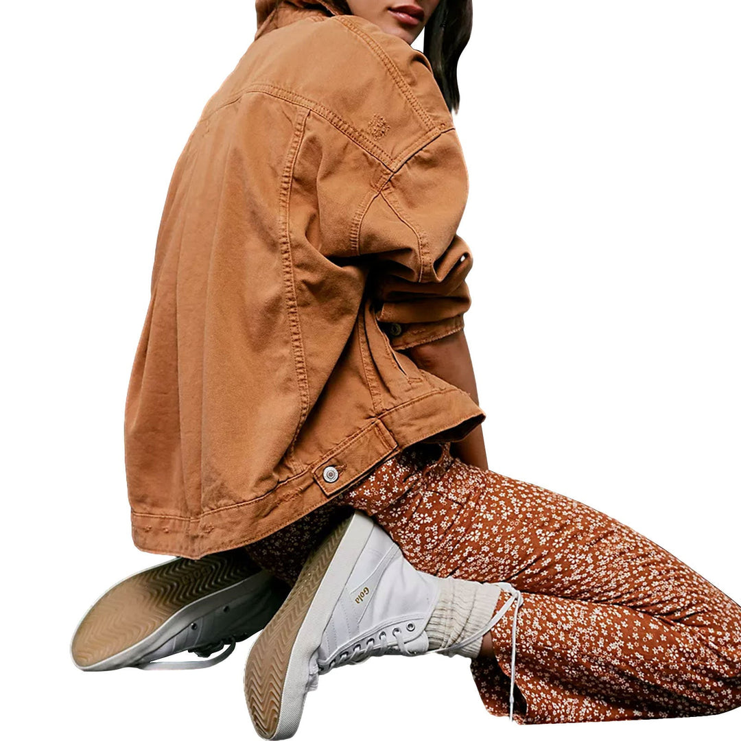Light blue women's oversized jacket, a chic & comfortable layering piece for versatile street style.