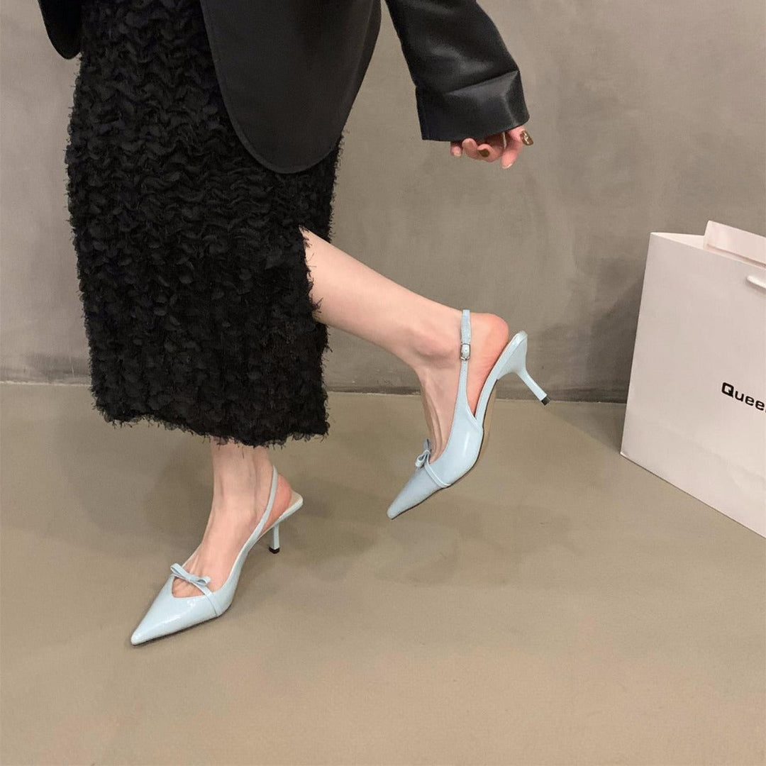 Formal women's slingback pumps with a sharp pointed toe, comfortable for office wear & elegant dress shoes.