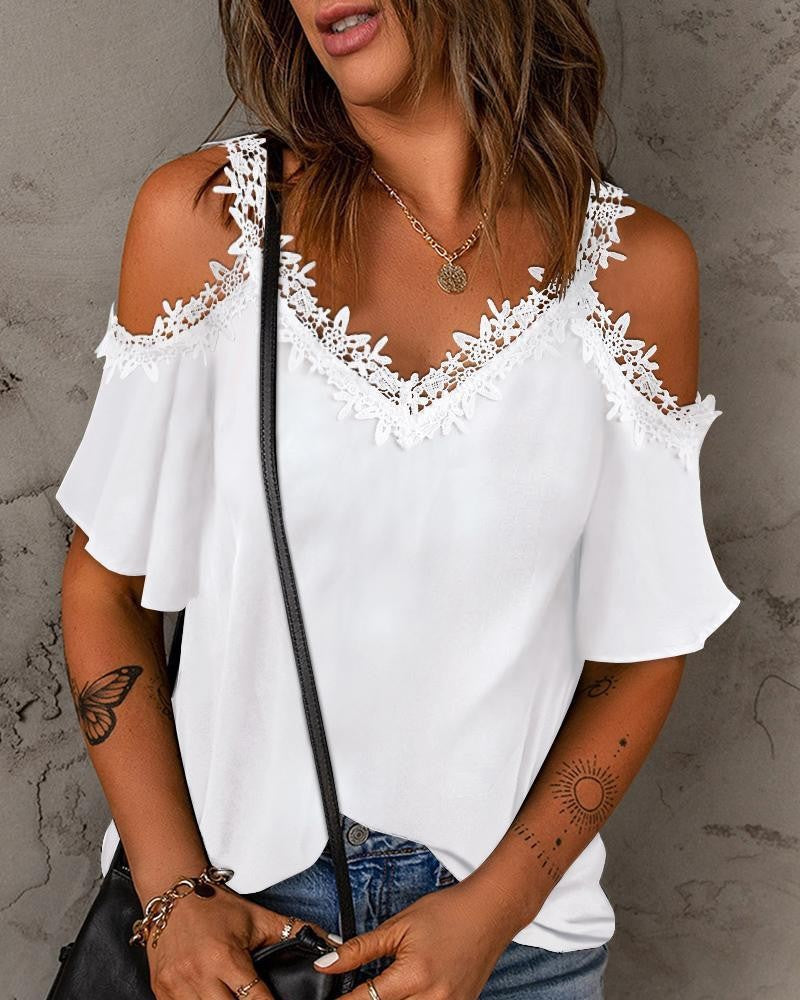 Beautiful women's white lace cold shoulder top, featuring a stylish off-shoulder design for elegant summer fashion.