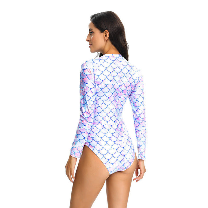 Close-up of women's long sleeve zip swimsuit, showcasing UV protection fabric & flattering fit.