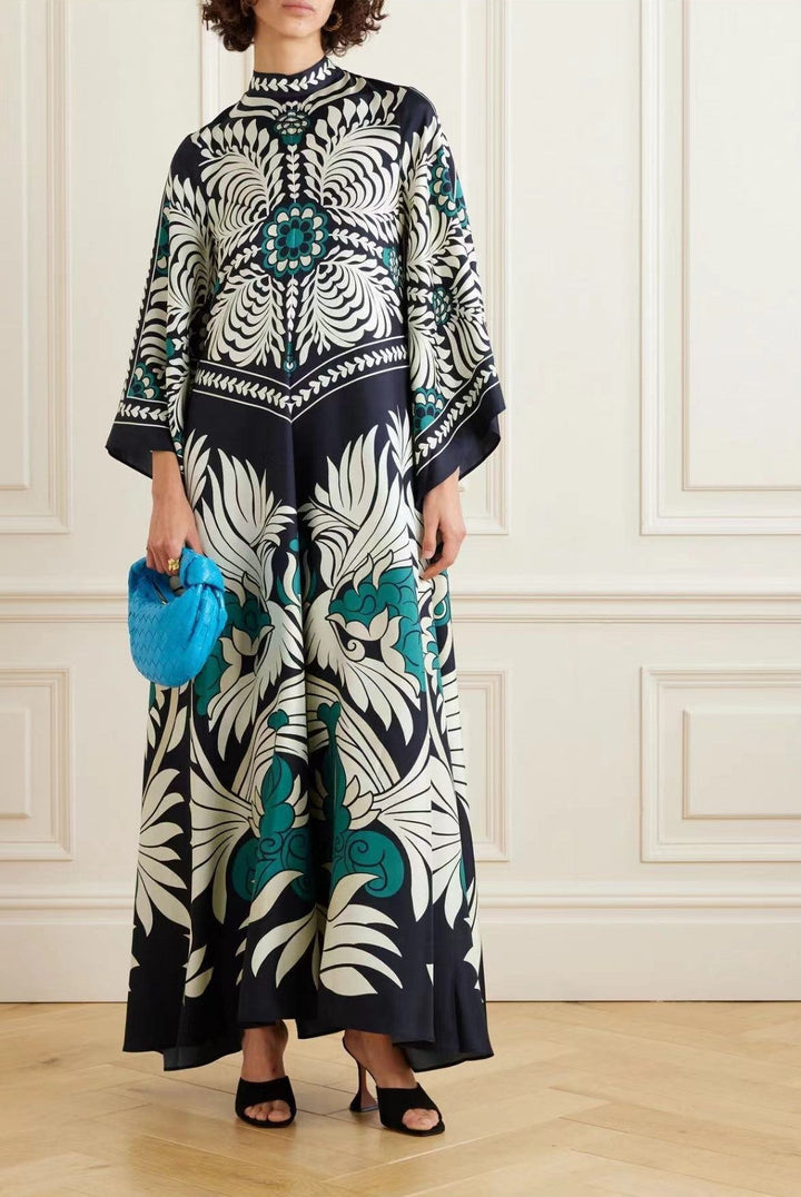 Women's party-ready elegant dress, colorful 3D print, three-quarter sleeves, flowy maxi length.