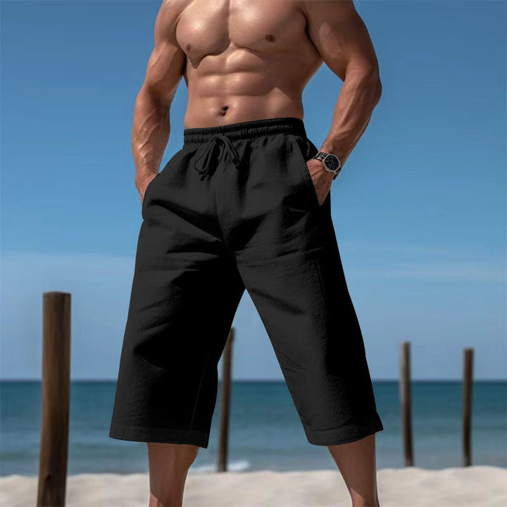 Men's elastic waist casual shorts, essential summer apparel for beach & vacation.