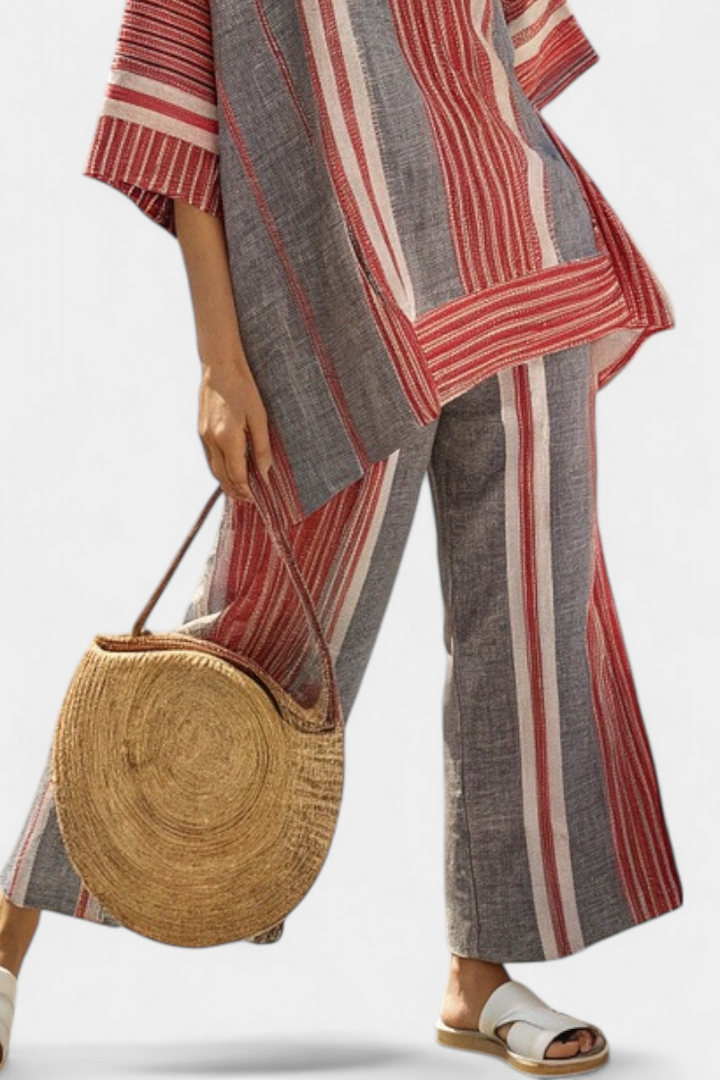 Matching women's striped top & wide-leg pants set in coral gray, an elegant two-piece for summer or resort wear.