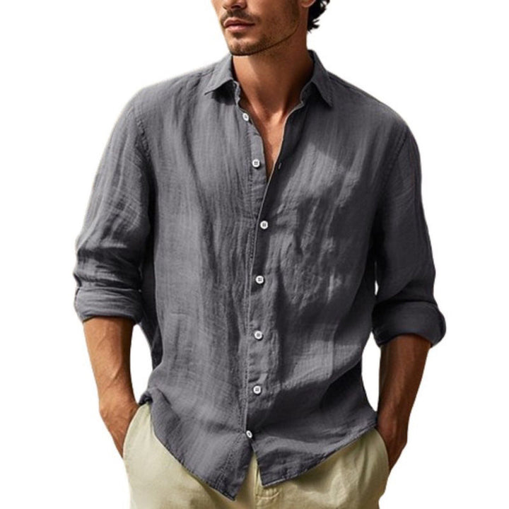 Relaxed fit men's button-up shirt, lightweight and breathable short-sleeve top for summer comfort.