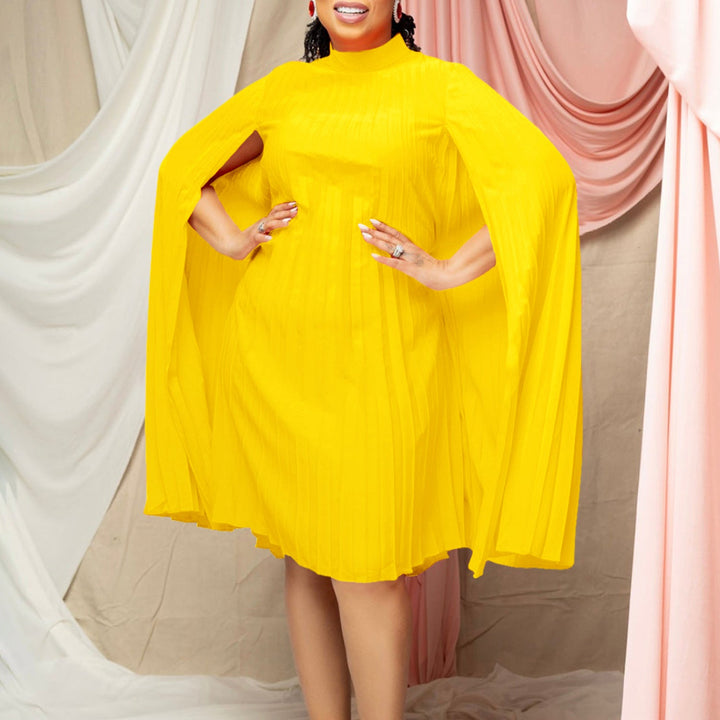 Stylish women's black cape dress, pleated design, high collar & long sleeves. Perfect elegant party wear.