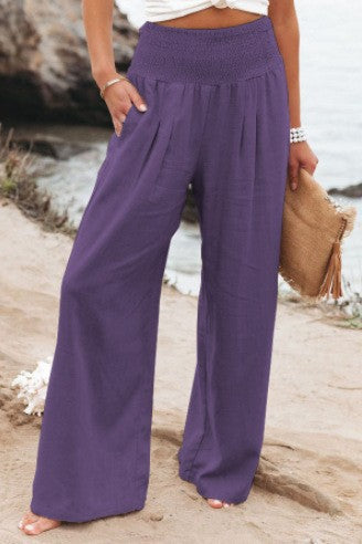 Effortless women's wide leg pants, comfy elastic waist, relaxed and chic for summer beachwear.