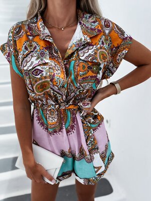 Women's elegant printed short sleeve jumpsuit, cinched with a fashionable waist belt for a chic look.