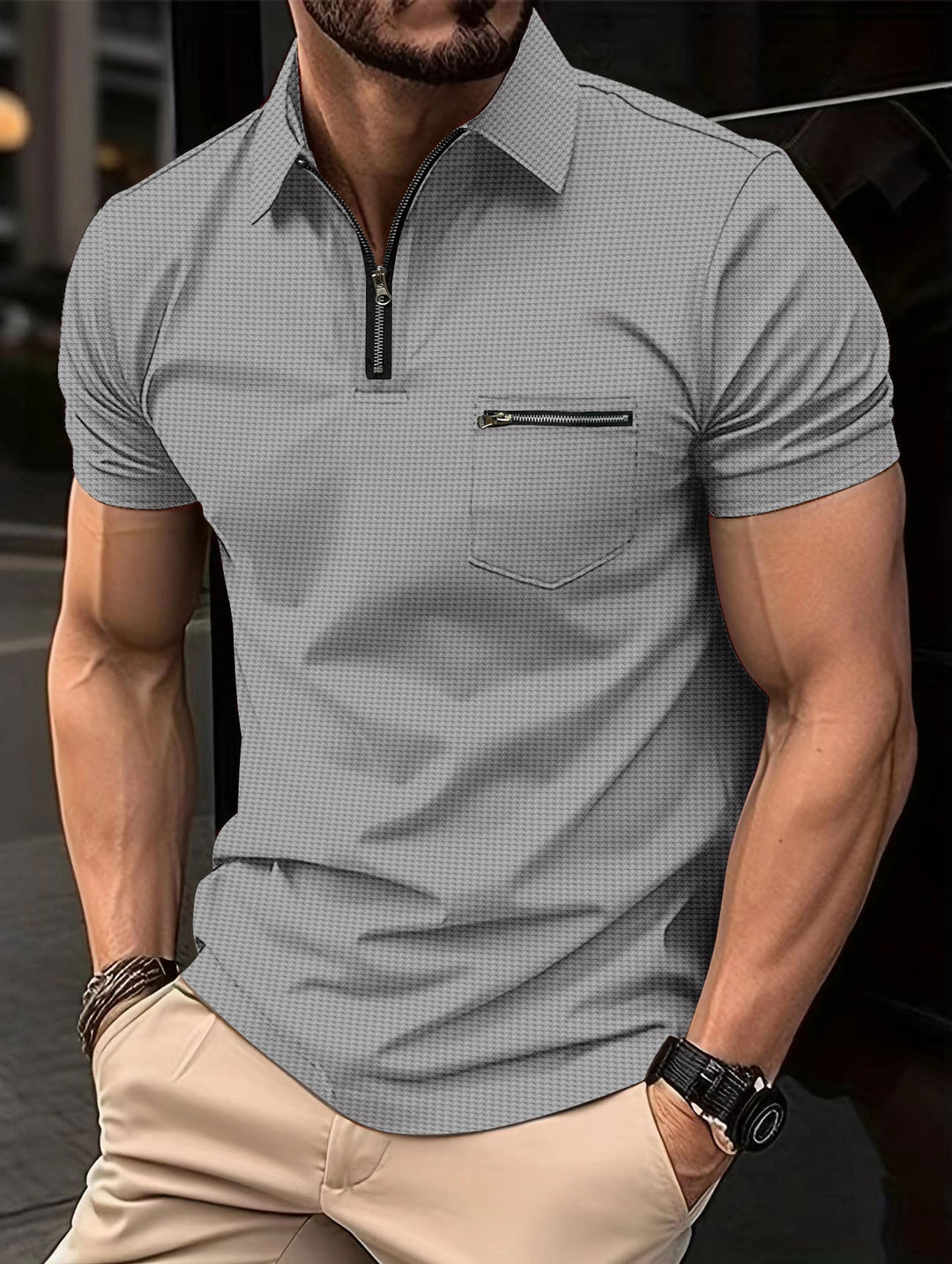 Front view of a men's modern short sleeve polo shirt, showcasing its chic zipper and collared design.