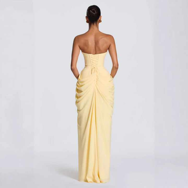 Women's elegant evening gown, full-length with long sleeves, delicate draping, and a flattering side slit.