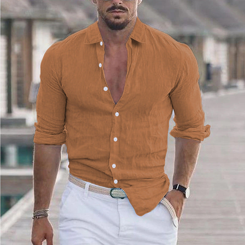 Detail of the crisp collar on a stylish men's button-up shirt, perfect for warm weather.