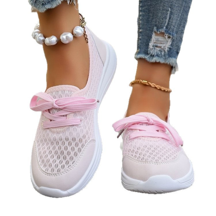 Women's comfort sneakers, breathable mesh upper for active lifestyle & daily wear.