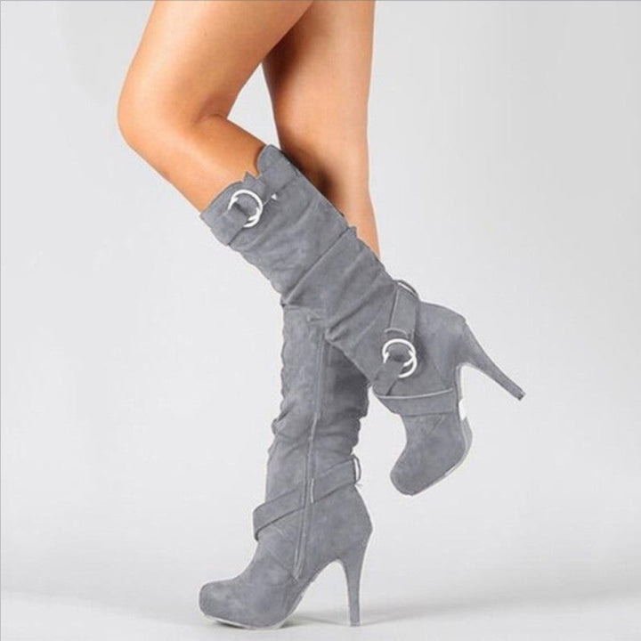 Stylish women's high heel buckle boots in black. Versatile for fall fashion, parties & elegant winter looks.