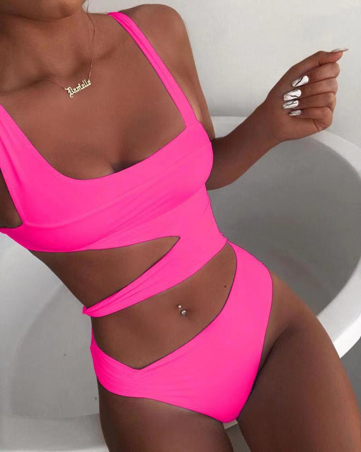 Summery women's push-up monokini swimsuit, stylish beachwear for a tropical vacation.