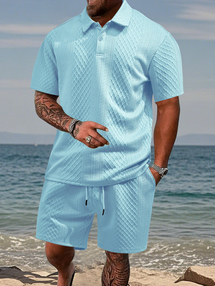 Athletic men's two-piece sportswear set with short sleeve polo and drawstring shorts.