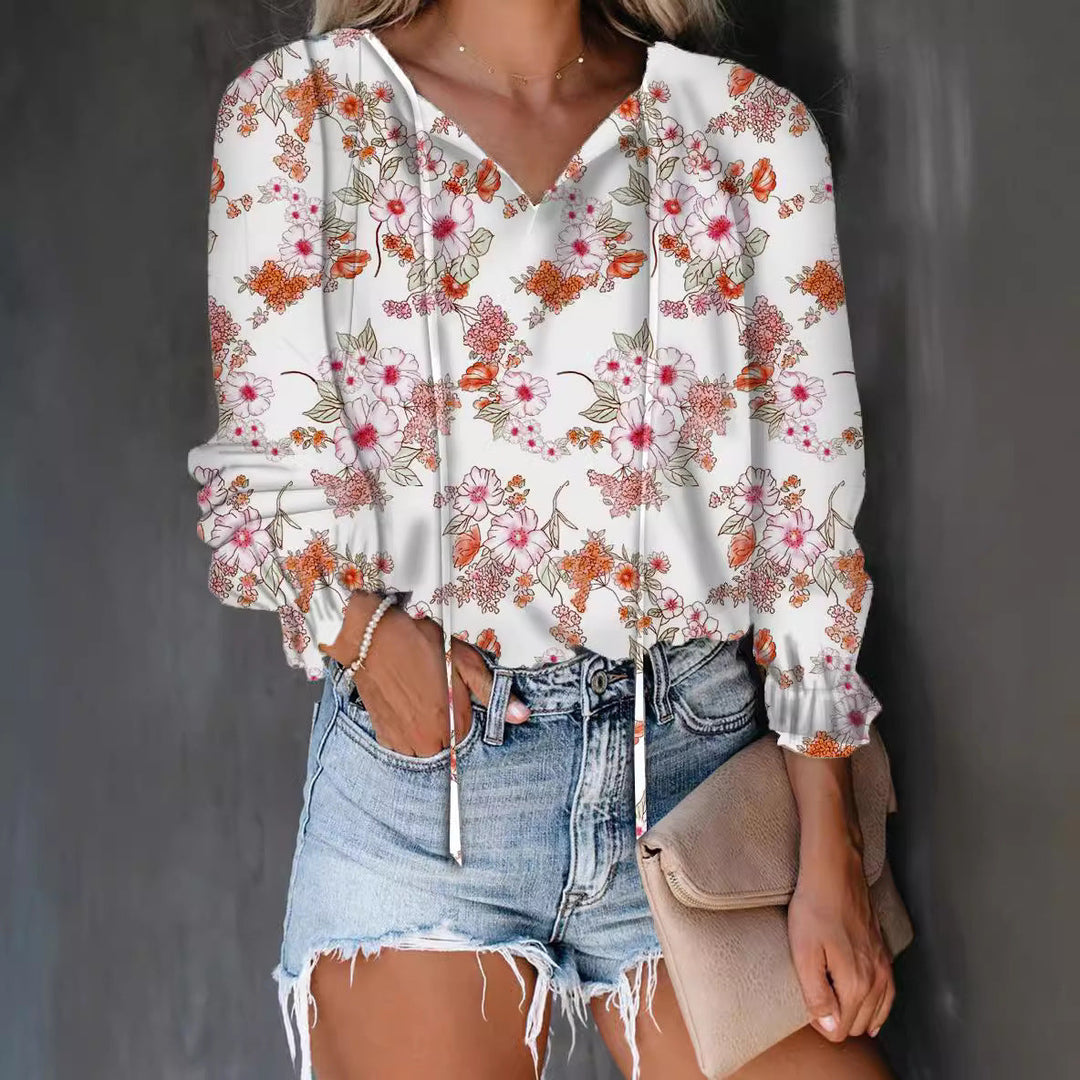 Versatile women's ruffle V-neck blouse, great for office or elegant casual wear.