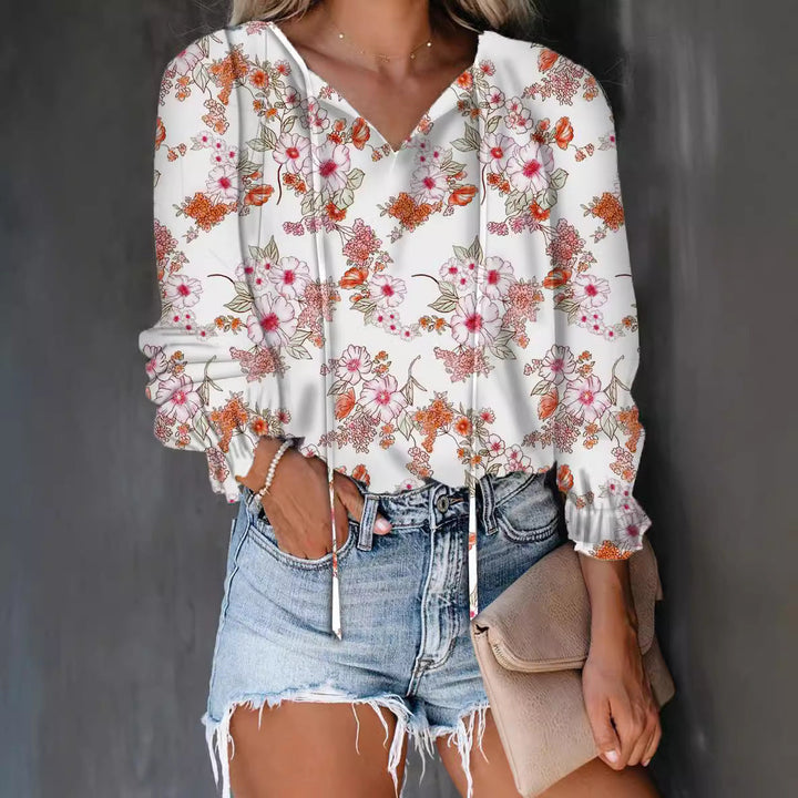 Versatile women's ruffle V-neck blouse, great for office or elegant casual wear.