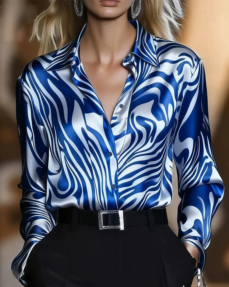 Women's elegant top with a unique wave pattern design, a stylish and versatile piece for summer outfits.