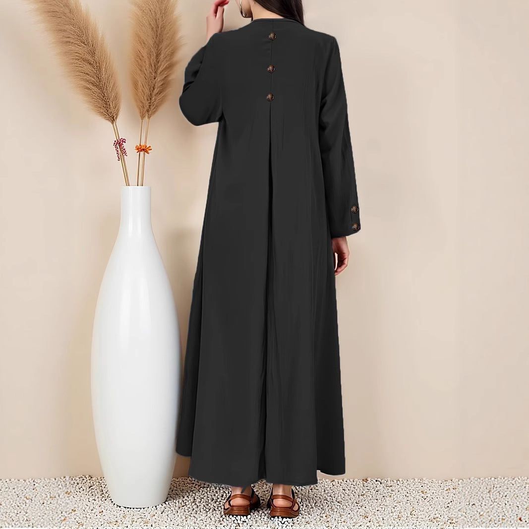 Versatile women's elegant button-front maxi dress. Comfortable long summer dress, ideal for casual or evening wear.