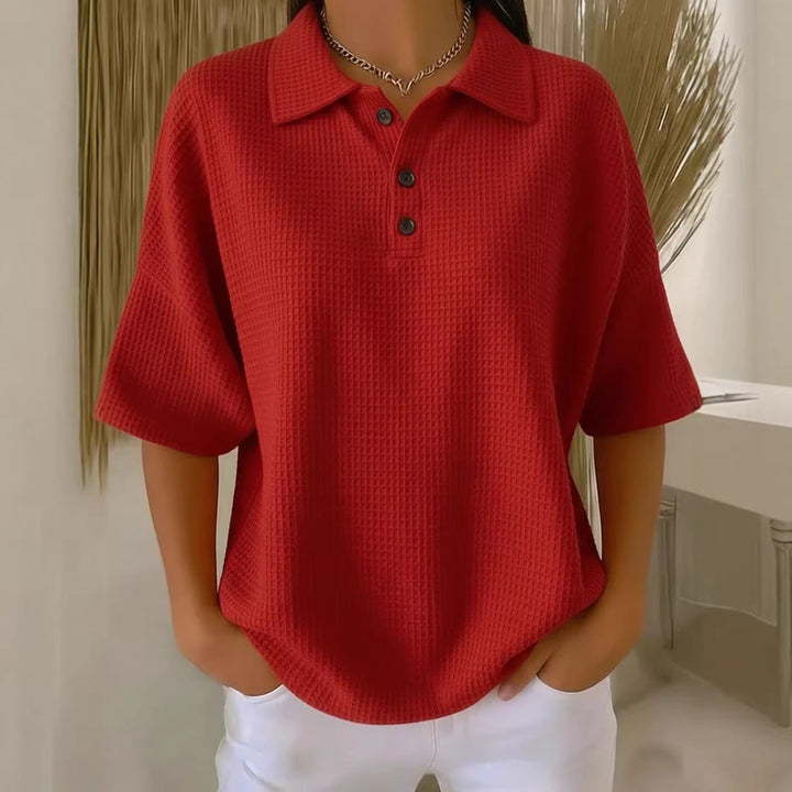 Essential women's short sleeve sporty polo shirt, offering everyday style & comfort for casual outings.