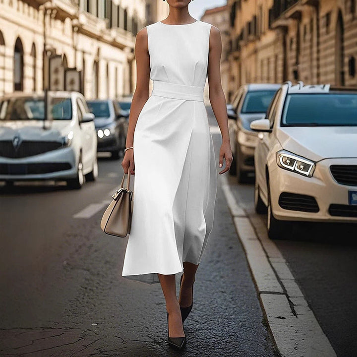 Comfortable & stylish long black evening gown for women, with elegant drape and slim waist design.