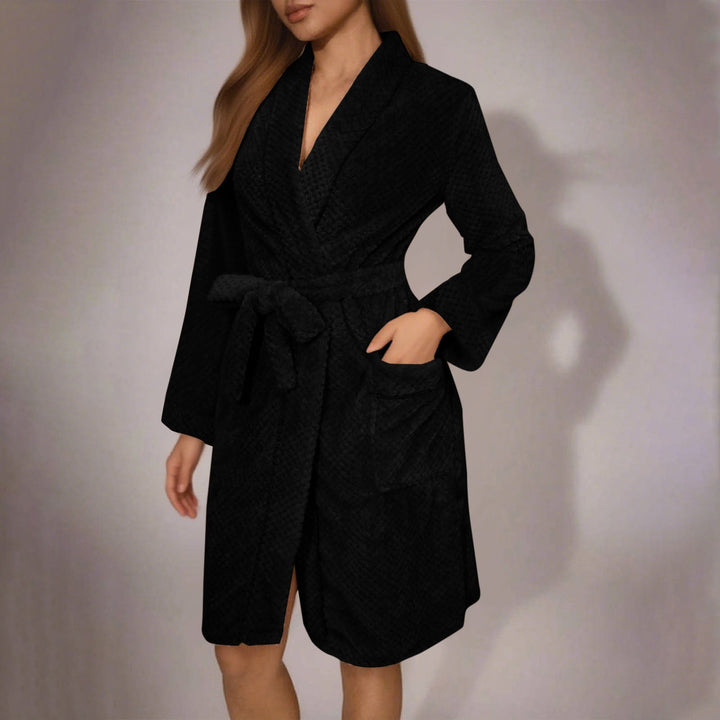 Elegant women's plush bathrobe, belted style with pockets, perfect for sophisticated loungewear.