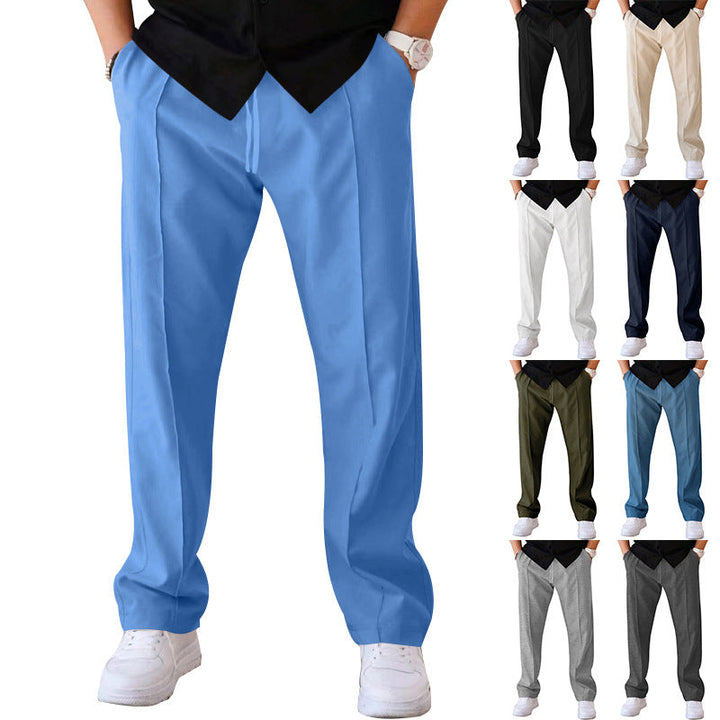 Back view of men's grey sweatpants, showcasing the comfortable relaxed fit and design.