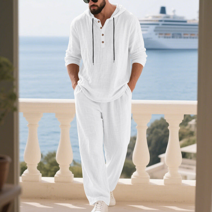Men's casual hoodie and jogger set in a relaxed fit, featuring convenient pockets.