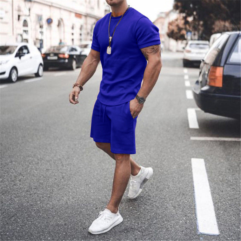 Athletic men's two-piece set, featuring a comfortable t-shirt and matching shorts.