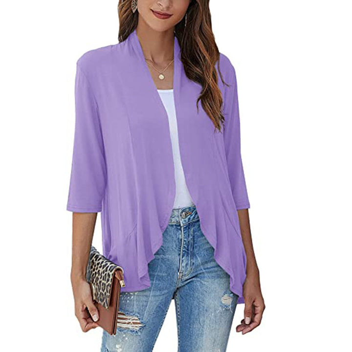Modern women's 3/4 sleeve open-front jacket. A stylish lightweight topper for fashion-forward outfits.