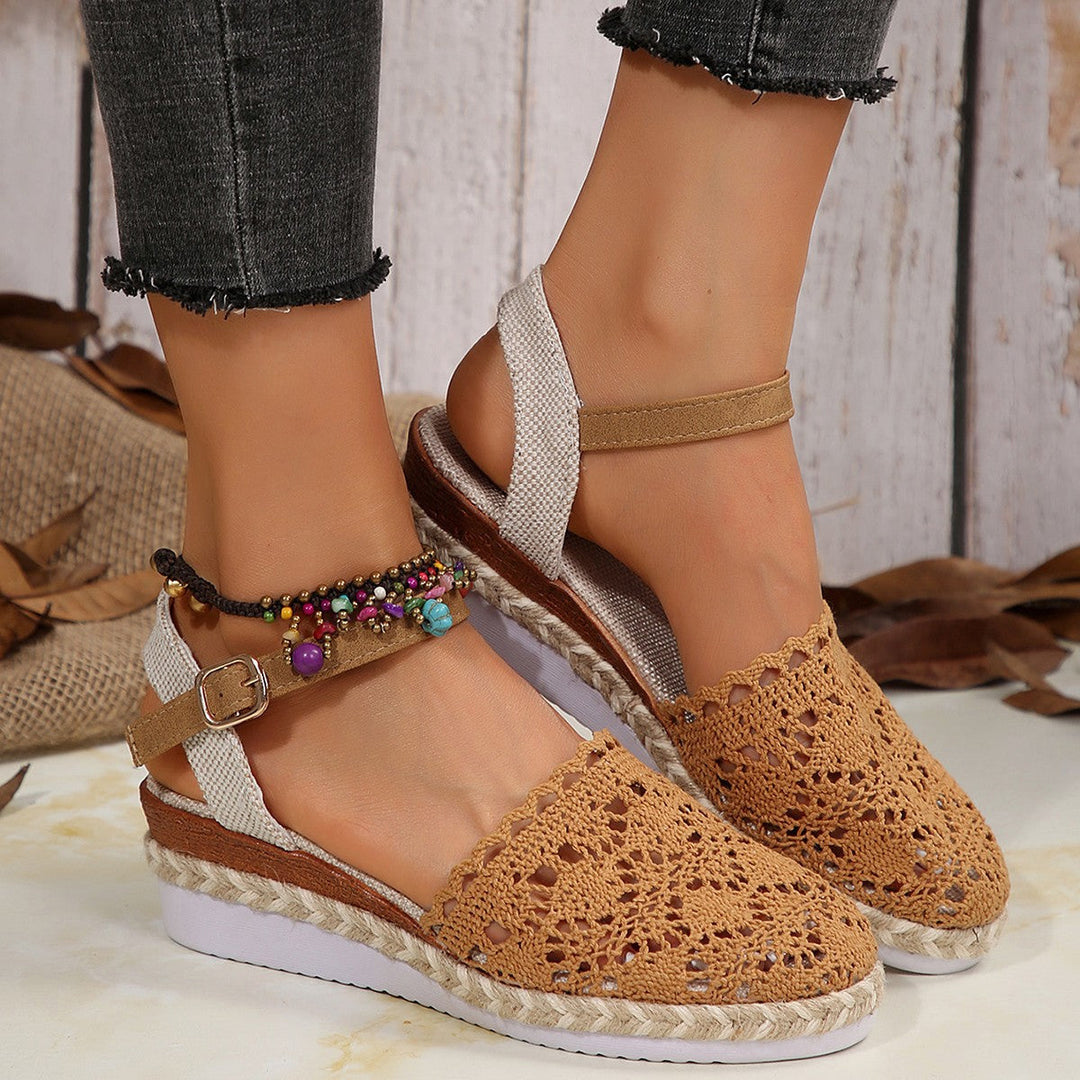 Chic violet espadrilles featuring an elegant ankle strap, versatile for summer and everyday wear.