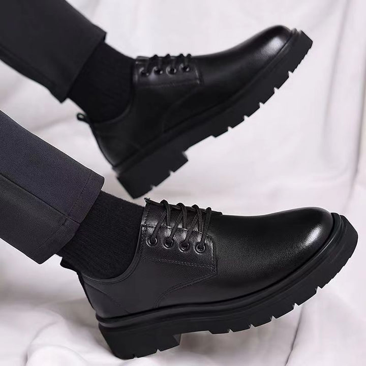 Classic black men's lace-up oxfords for formal or business casual wear. Comfortable, versatile dress shoes.