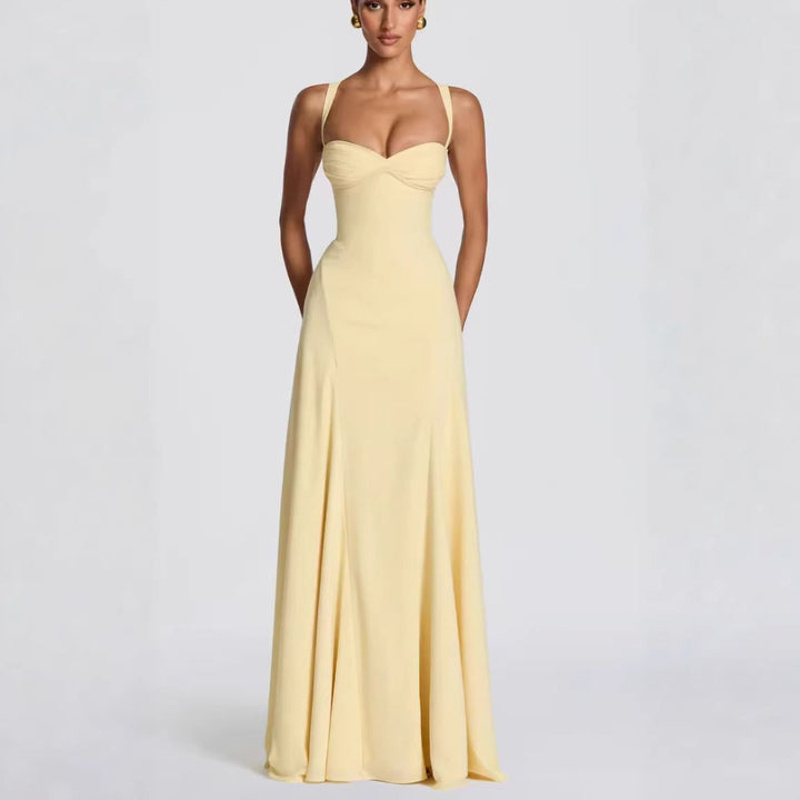 Long elegant women's maxi dress featuring a flattering heart neckline & flowing silhouette for any formal event.