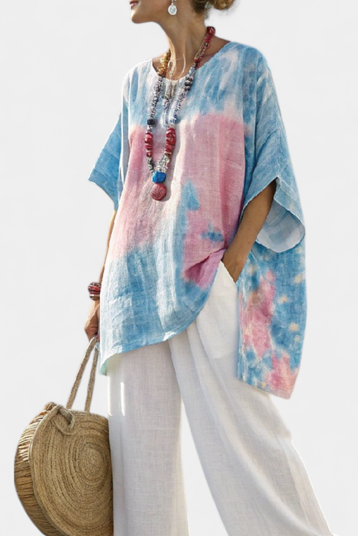 Relaxed fit women's two-piece set featuring a flowing top & stylish striped pants. Ideal for summer casual elegance.
