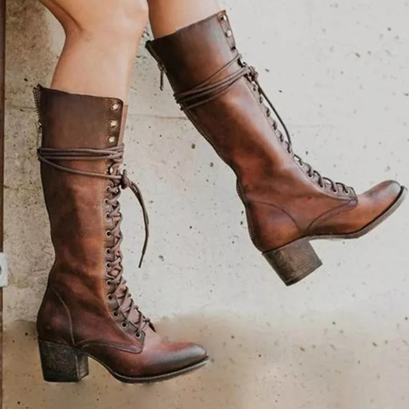 Versatile women's fashion boots: knee-high, lace-up, and designed for all-day winter style.