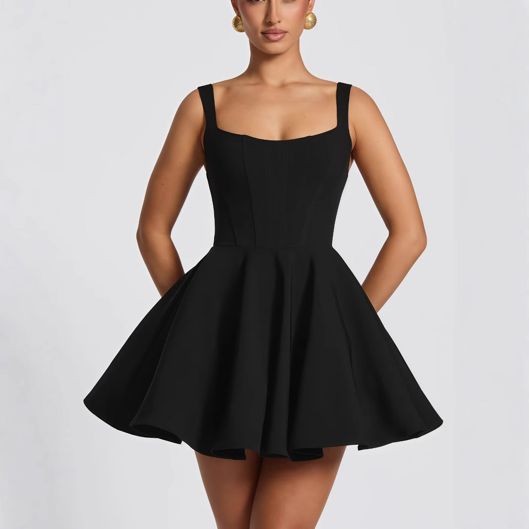 Sophisticated women's party dress featuring a dramatic bow and graceful flowing skirt.