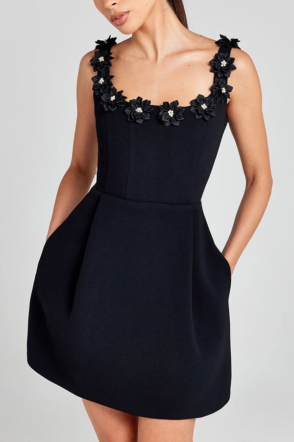 Stylish women's cocktail mini dress with floral embellishments. Ideal party & occasion wear.