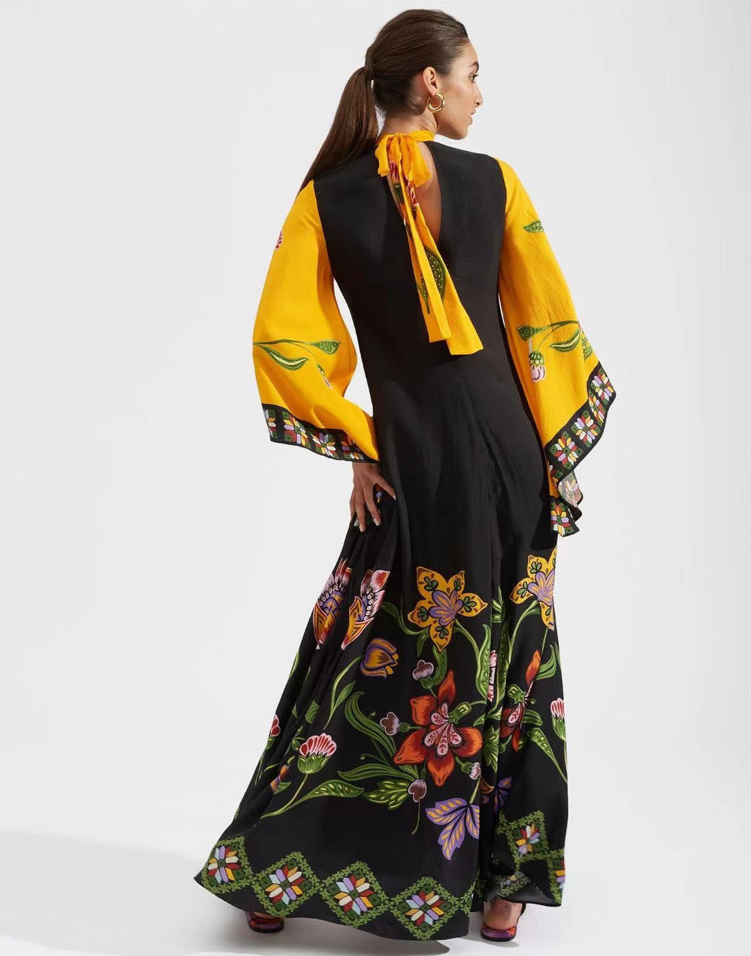 Vibrant 3D print elegant women's dress with three-quarter sleeves. Flowy A-line perfect for comfort.