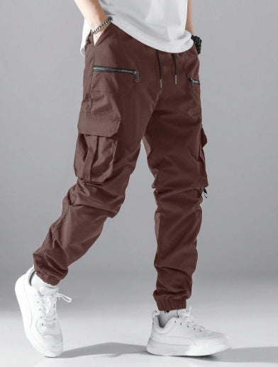 Men's urban cargo pants with adjustable waist, ensuring comfortable fit & functional pockets for streetwear.